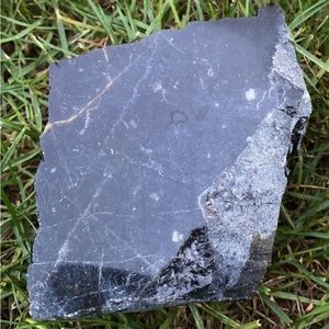 Polished black obsidian stone/crystal piece
